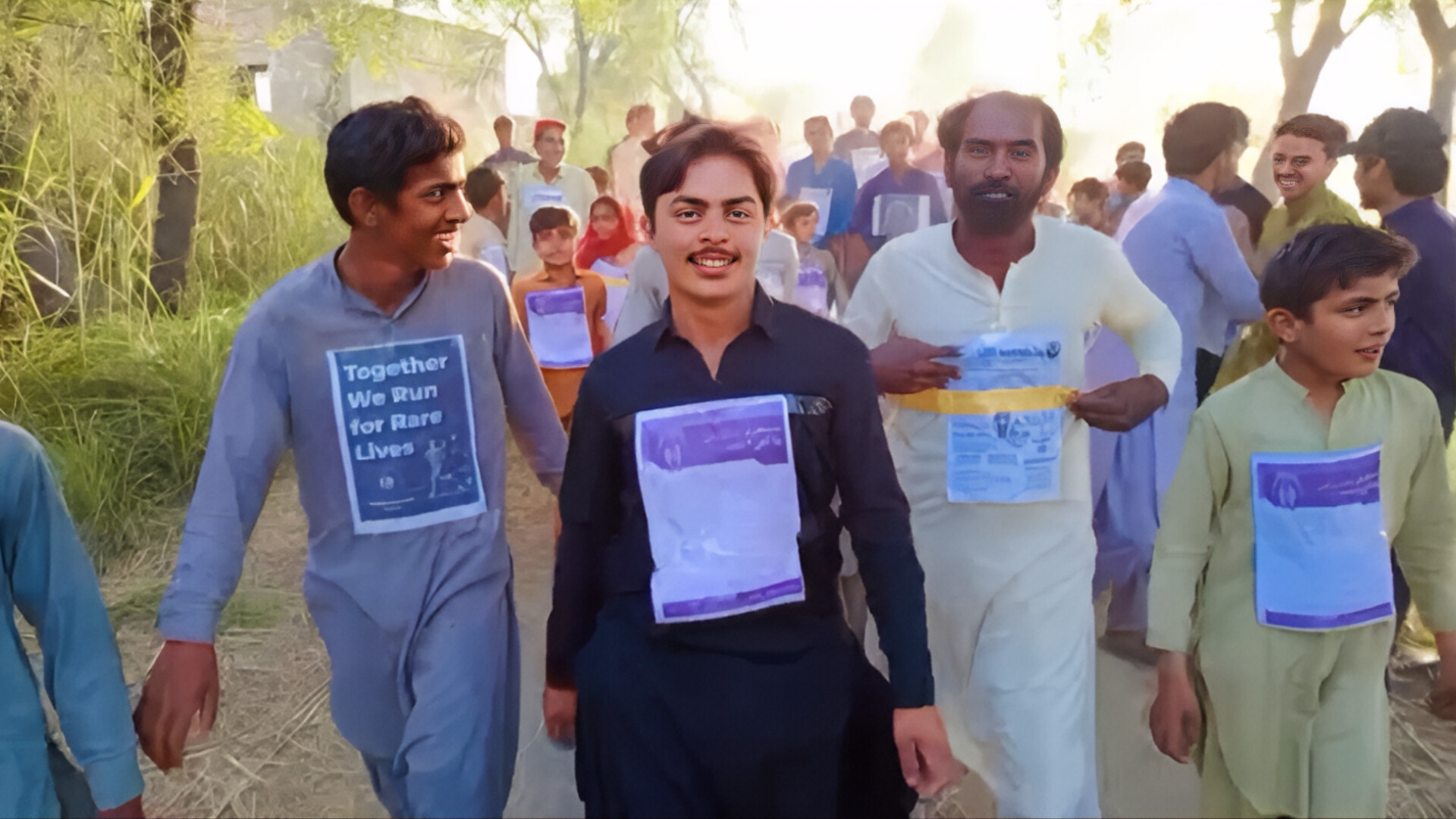 Youth Raising Placards for Rare Lives